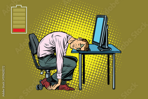 businessman sleeping at the computer