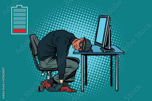 Sleeping African hacker at the computer