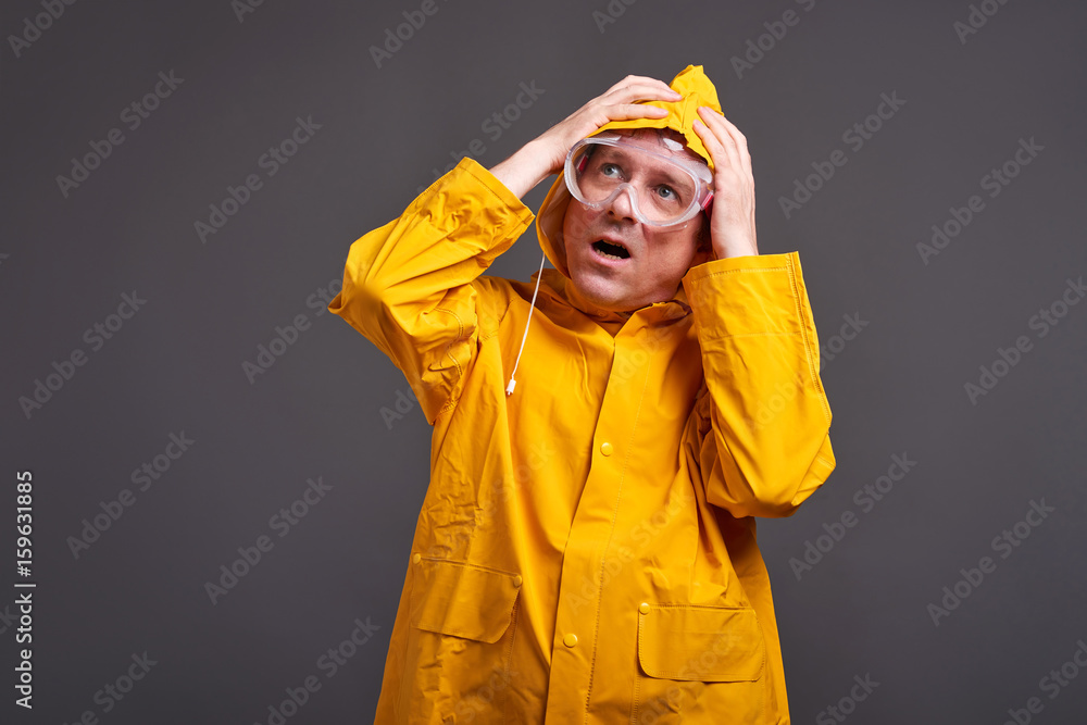 Man in yellow raincoat Man in yellow raincoat