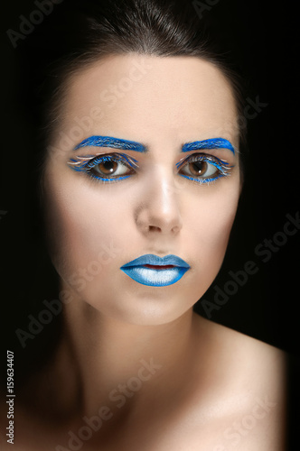 Beautiful young woman with ...