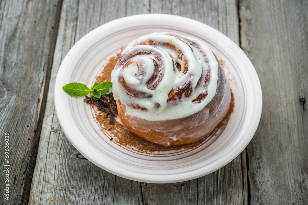 Cinnamon rolls with almond on the table. Cinnamon rolls with almond on the table.