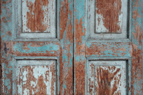 Blue color old vintage door pattern background.