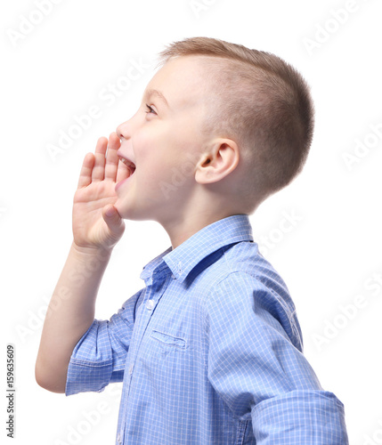 Cute little boy on white background photo