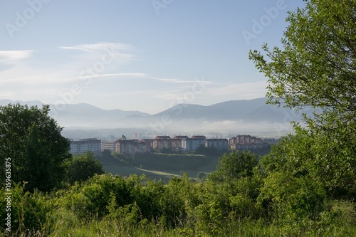 Sunrise and sunset over the buildings in the Zilina city. Slovakia