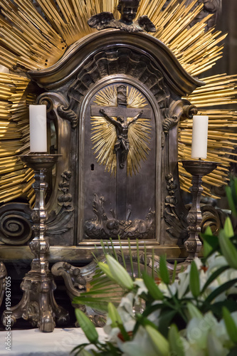 Fototapeta Naklejka Na Ścianę i Meble -  Crucifix with candles in the catholic church