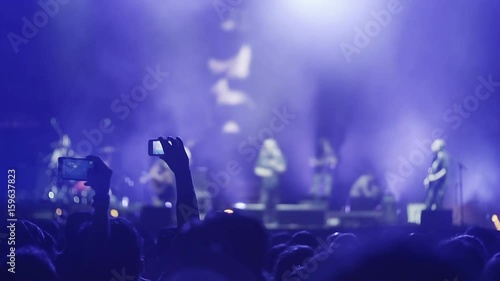 Wallpaper Mural Recording a night music concert with cellphone or tablet 100p Torontodigital.ca