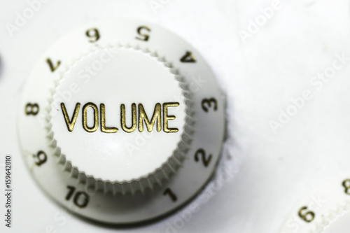 Close up Volume Control Knob on Electric Guitar