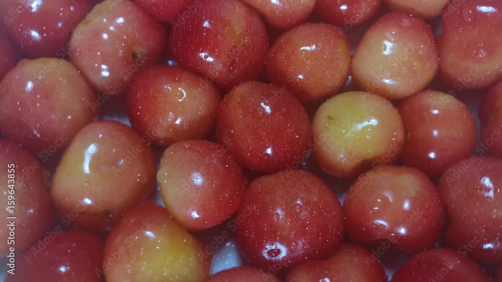 Great background of fresh Bright cherry's berry rotating close up. Footage will work great for any videos dealing with summer, fun, relaxation, healthy nutrition and much more. Great background of fresh Bright cherry's berry rotating close up. Footage will work great for any videos dealing with summer, fun, relaxation, healthy nutrition and much more.