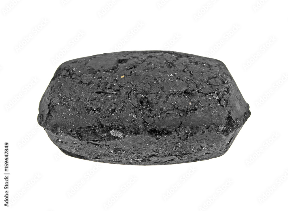 Fototapeta premium Coal briquette for BBQ isolated on a white background