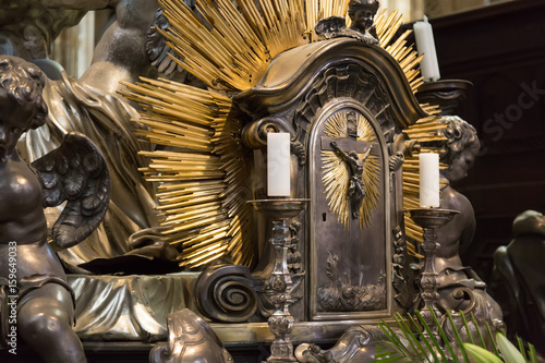 Fototapeta Naklejka Na Ścianę i Meble -  Crucifix with candles in the catholic church