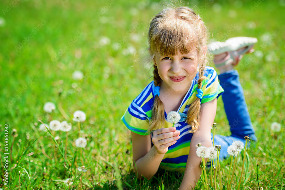 funny child with dandelions funny child with dandelions