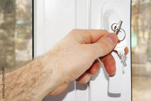 close window key lock safety children photo