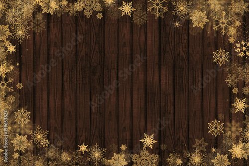 Merry Christmas design with wood background and gold showflakes border photo