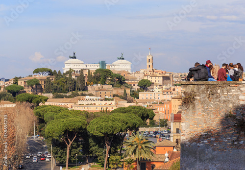 Italy Rome - FEBRUARY 12, 2017: tourists on the observation deck on the Aventine Hill, look at the Capitol Hill. Editorial