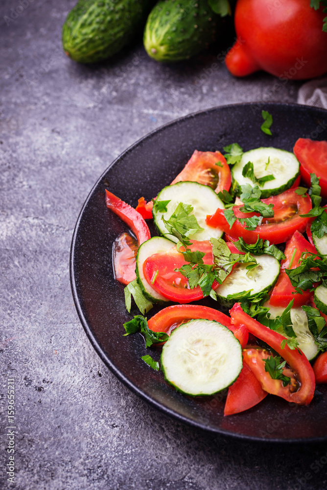Vegetable salad with cucumber and tomato Vegetable salad with cucumber and tomato