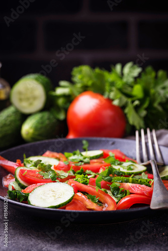 Vegetable salad with cucumber and tomato