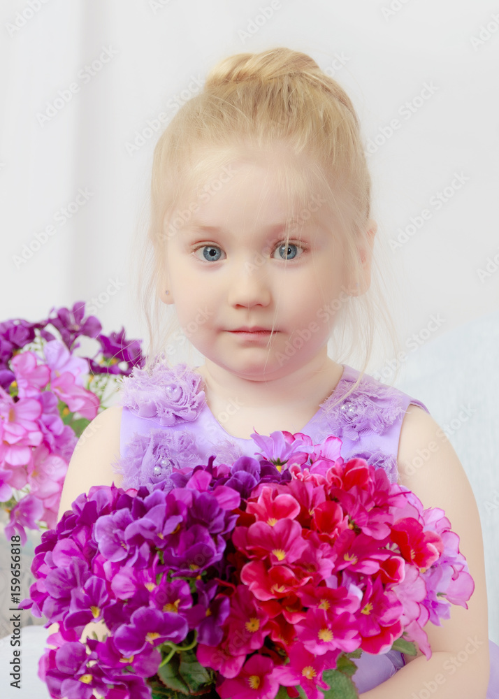 girl with a bouquet of flowers. girl with a bouquet of flowers.