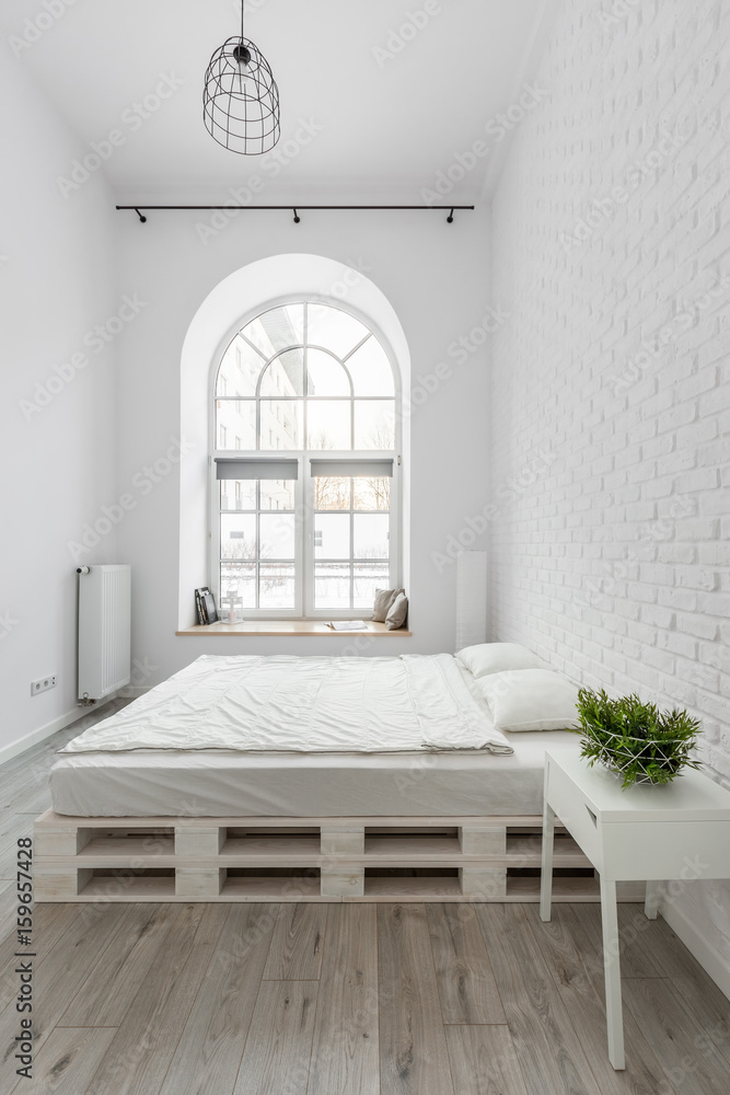 White bedroom with pallet bed