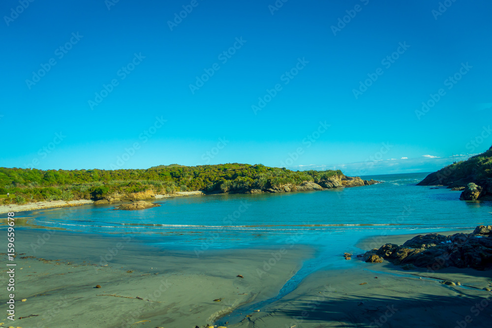Obraz premium Sandy beach in Cape Foulwind on the West Coast of New Zealand
