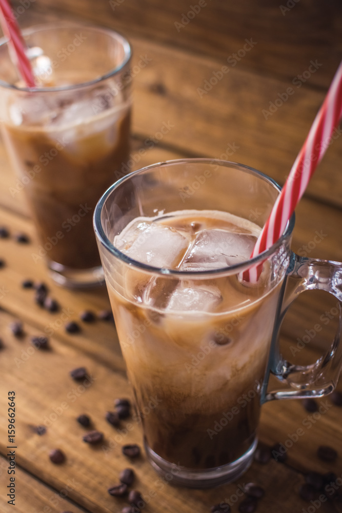 iced coffee on rustic wooden background. iced coffee on rustic wooden background.