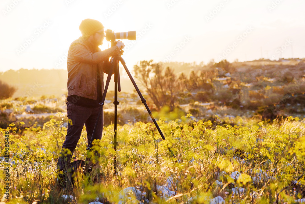 custom made wallpaper toronto digitalPortrait of photographer making photos with camera on tripod at sunset
