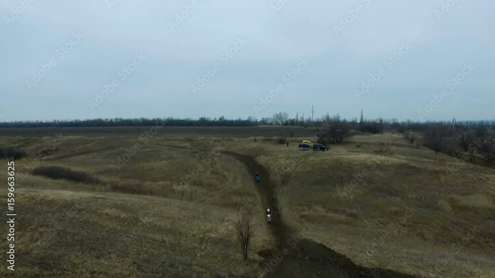 Professional Motocross Rider On Dirt Track.
