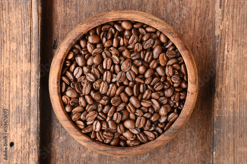 Freshly coffee beans in bowl for background