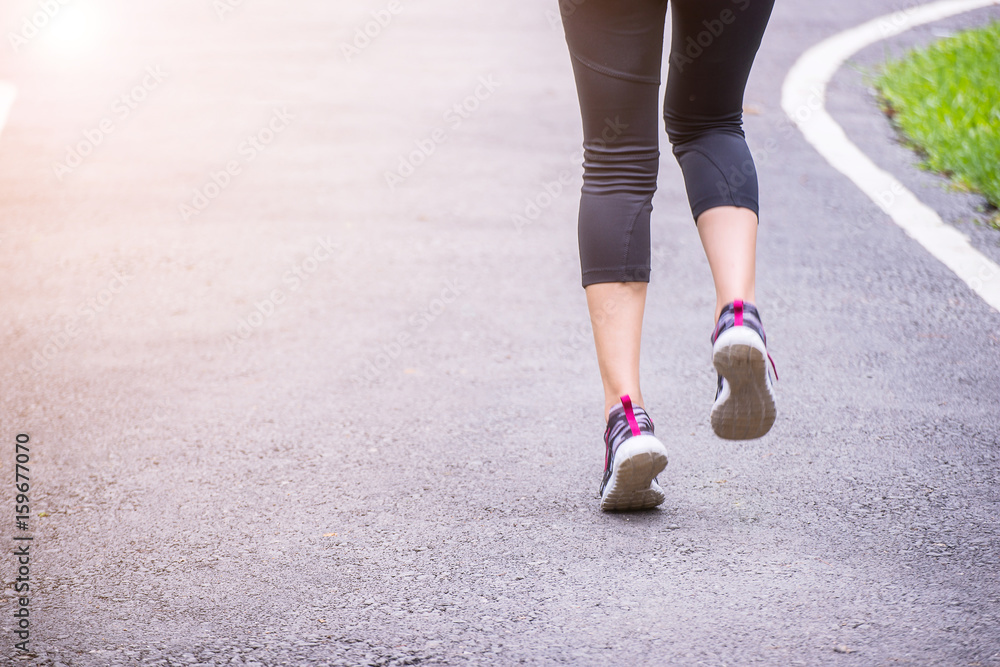 Woman running in park.