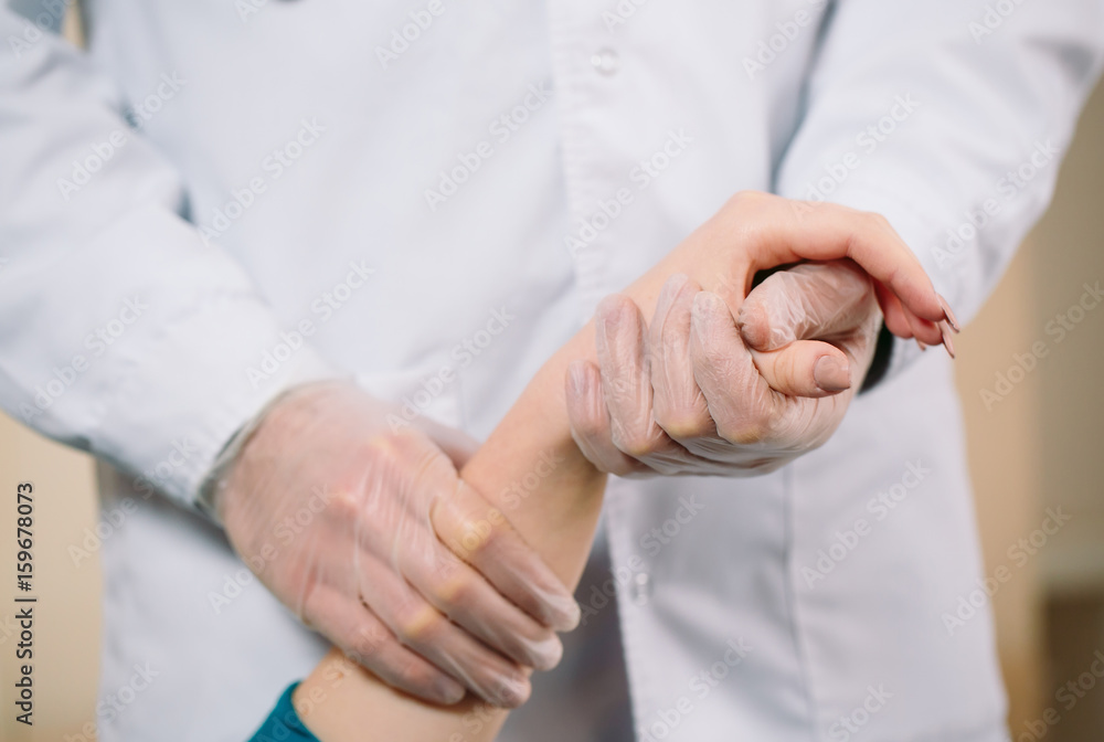 Doctor holding girl's hand Doctor holding girl's hand