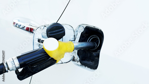 Refueling car with close up for saving energy concept photo