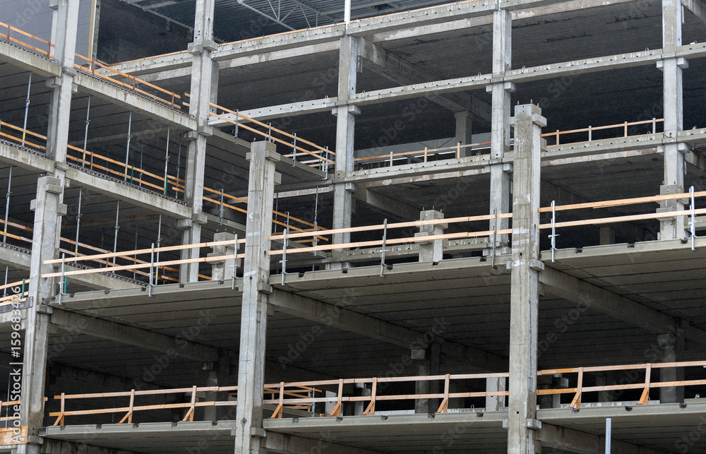 Large construction site with scaffolding building.