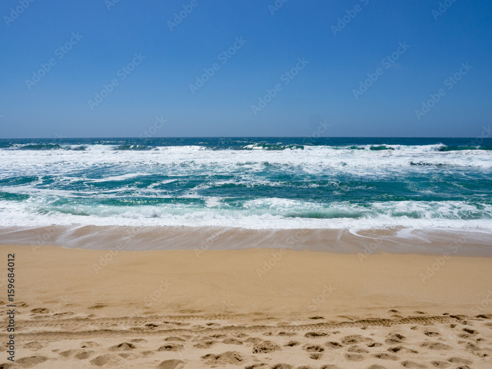 Ocean and sand at Montara State Beach Ocean and sand at Montara State Beach