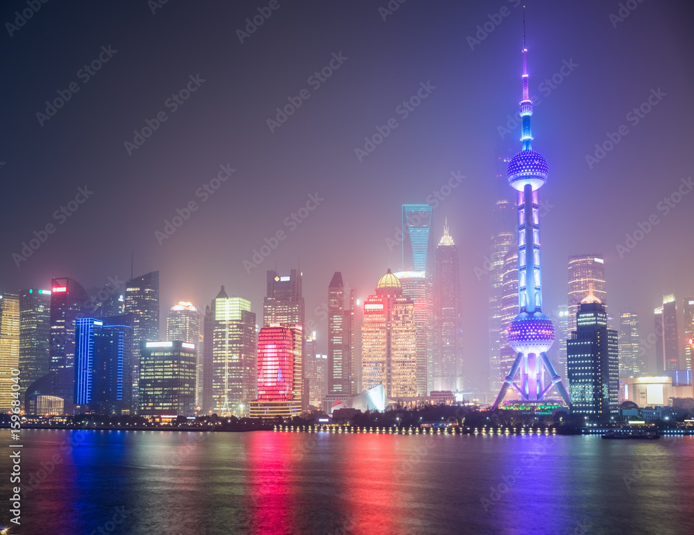 shanghai skyline in mist night