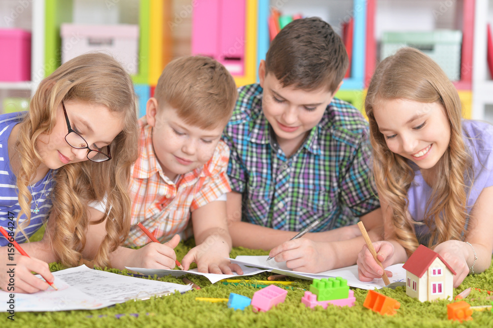 Fototapeta premium Group of children drawing with pencils