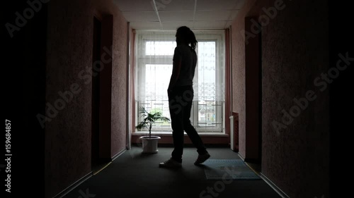 Wallpaper Mural The guy walks the corridor with the phone. A man is nervous and calls someone, walks the corridor. Torontodigital.ca