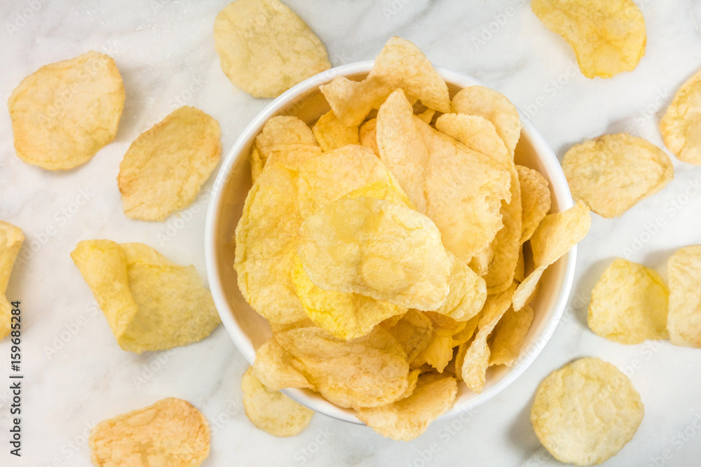 Potato chips, shot from above with copyspace
