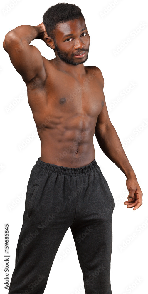 Handsome guy showing his strong torso isolated on white Handsome guy showing his strong torso isolated on white