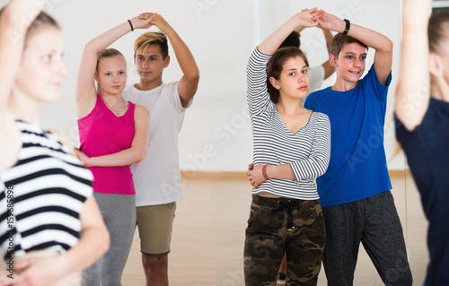 Portrait of young couples studying of partner dance