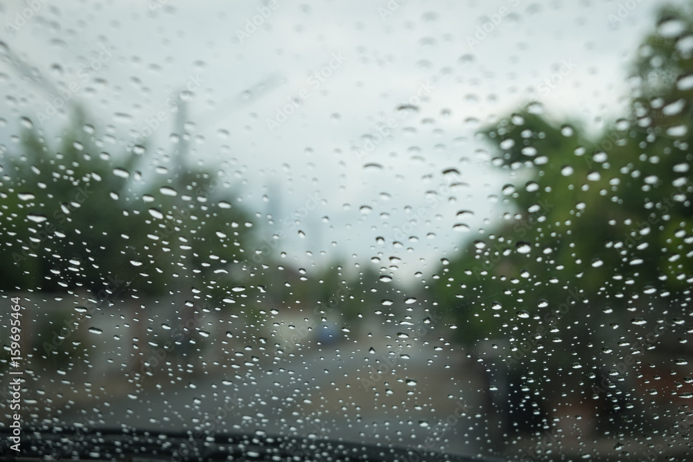Water drops on car glass after rain. Water drops on car glass after rain.