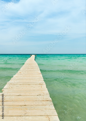 View from a wooden pier over the ocean