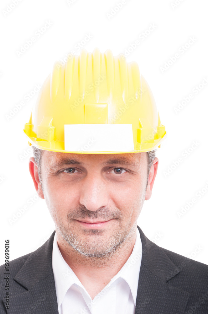 Close-up of foreman wearing hardhat with business card Close-up of foreman wearing hardhat with business card