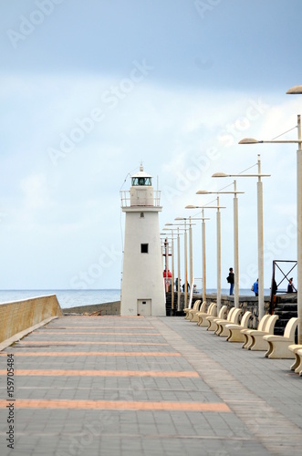 White lighthouse in Imperia Italy photo