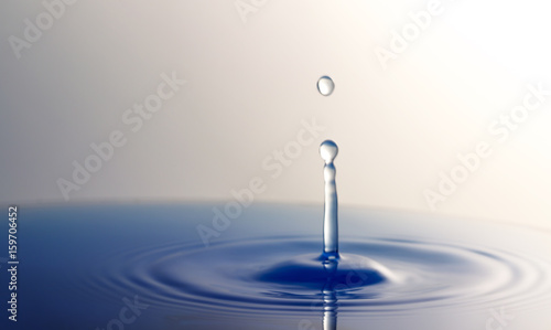 A blue water drop in photos.