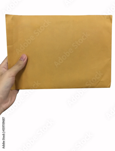 Hand hold brown envelope isolated on white background