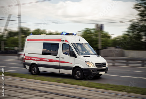 Fototapeta Naklejka Na Ścianę i Meble -  The ambulance car hastens for the aid