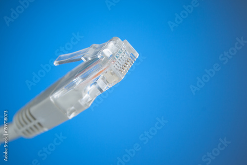 The concept of connection to the Internet. Plug RJ 45 close-up.