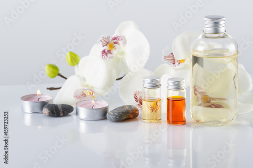 Spa concept. Aroma oil, candles, stones,orchid flowers