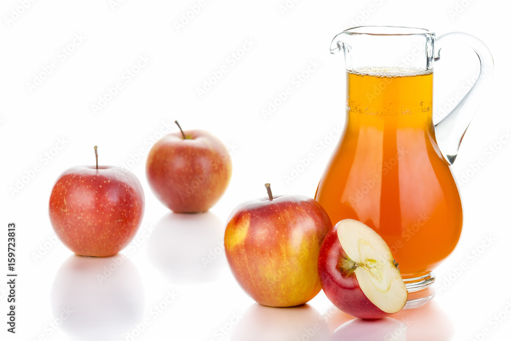 Fresh red apples, glass with juice on white background. Fresh red apples, glass with juice on white background.