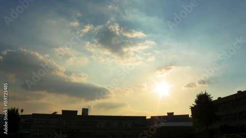 Beautiful sunset over the school building in asia