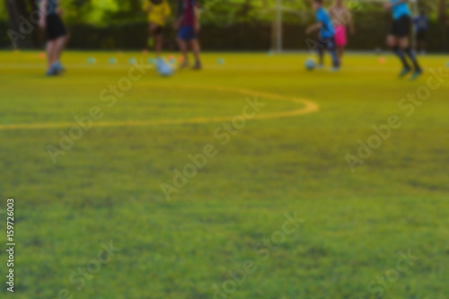 Children play football in the practice field